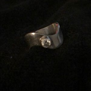Sterling silver wave band with stone.
